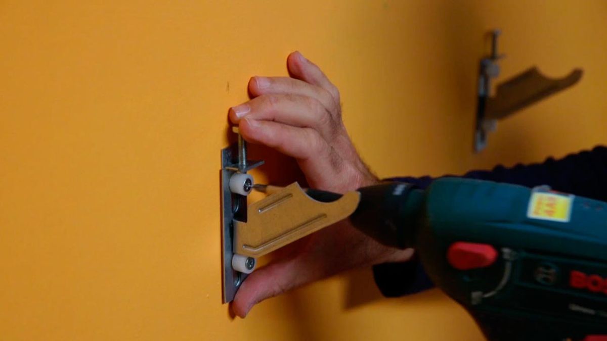 Soportes para radiador paso 5