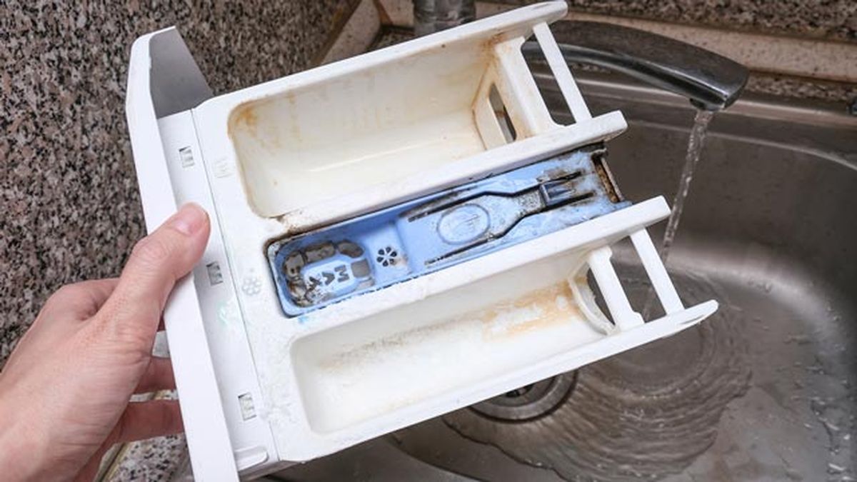 Suciedad del cajetín de la lavadora