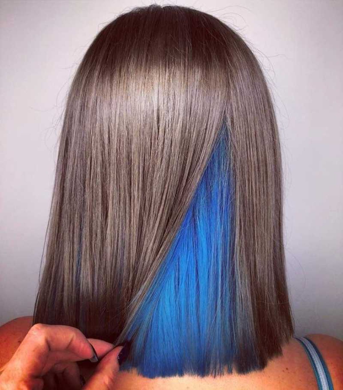 Teñido bajo la capa superior del cabello también llamado underlights