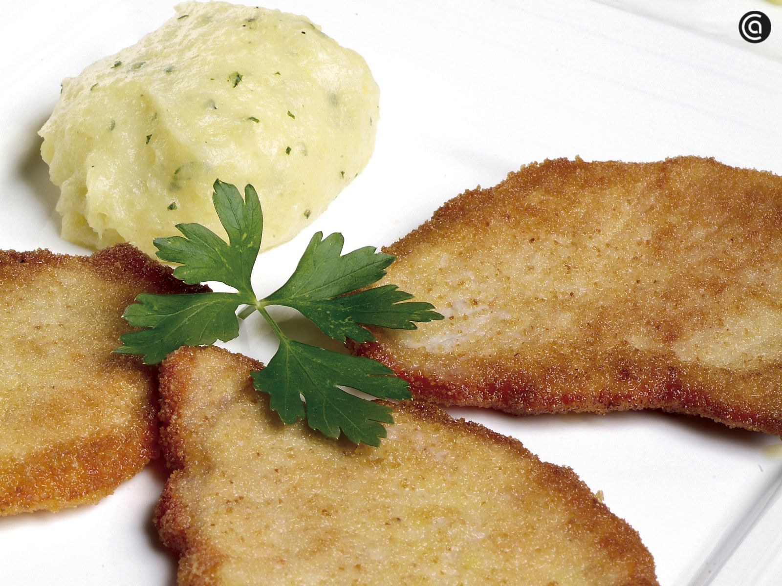 Receta de lomo empanado acompañado de puré de patatas