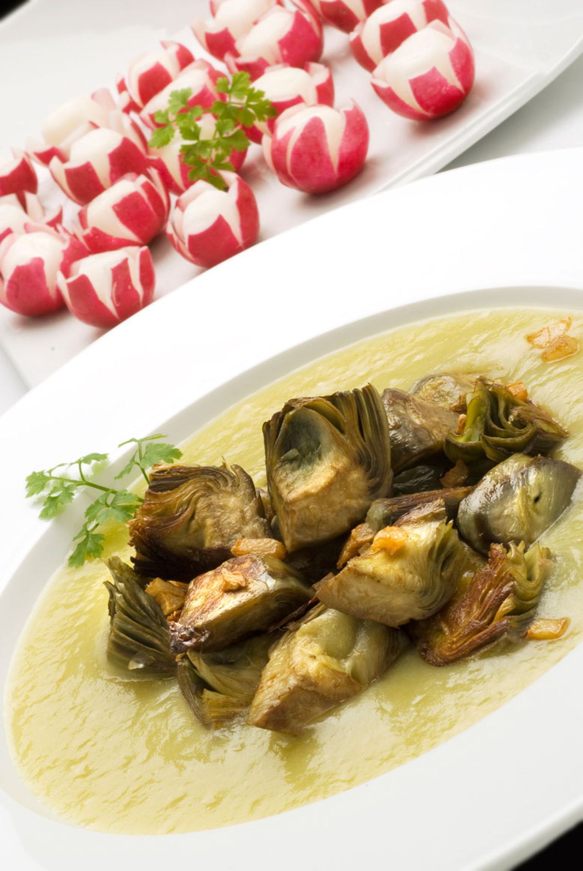 Alcachofas salteadas con puré de puerro y patata