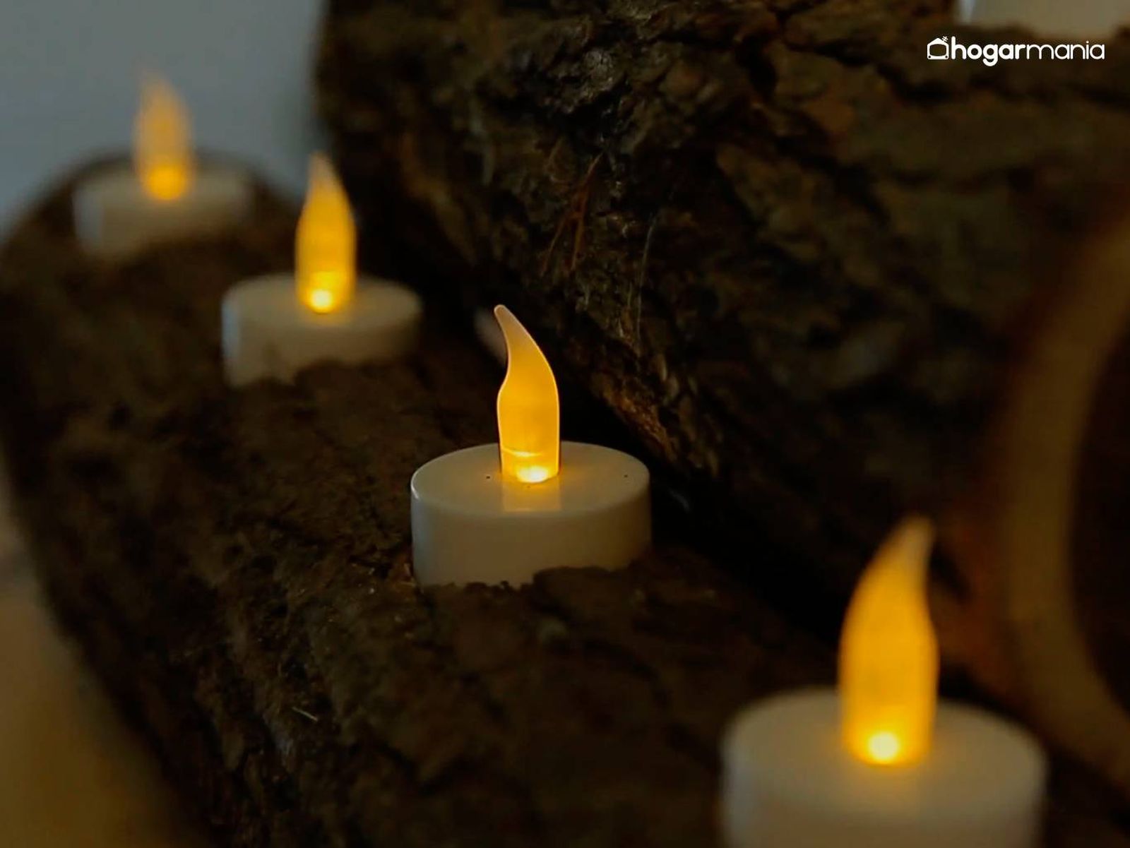Cómo hacer un centro de velas con troncos decorativos