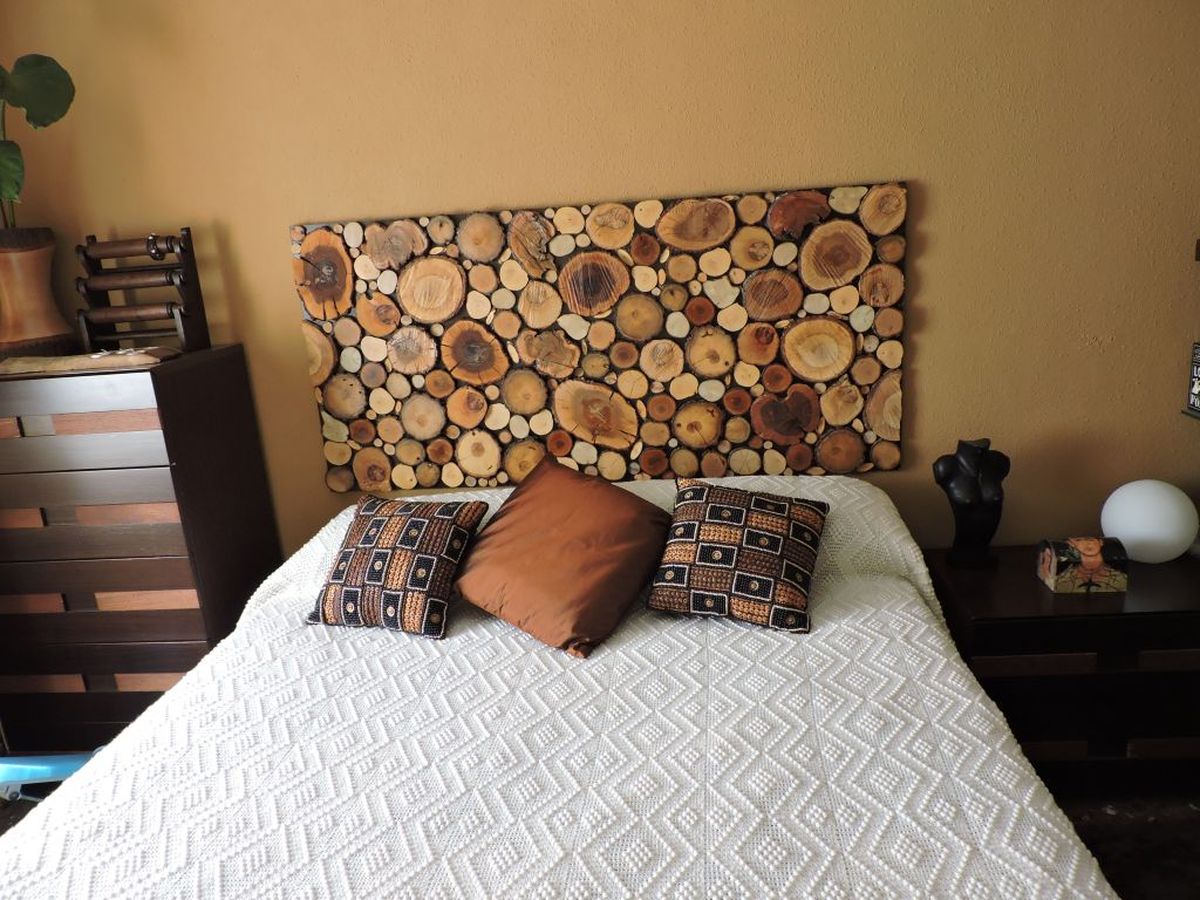 Cabeceros de madera en la comunidad de Hogarmania 7