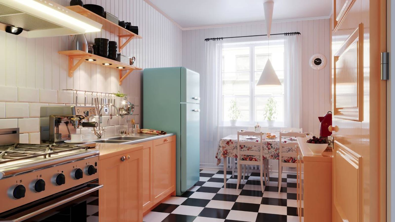 El suelo tipo damero y el frigorífico azul crean un ambiente de cocina retro inspirada en los años 50.