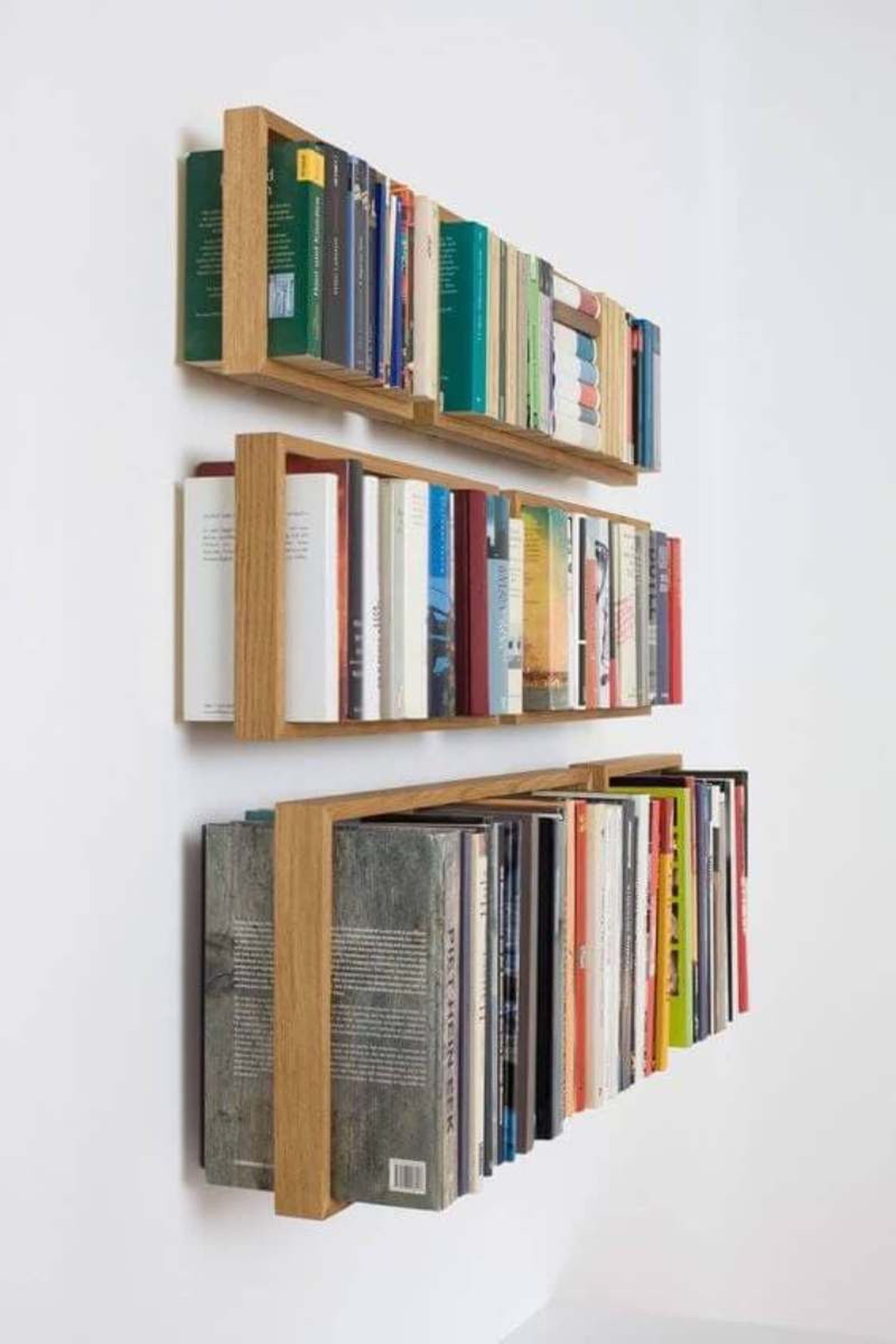 Libros organizados por tamaño Libros organizados por tamaño