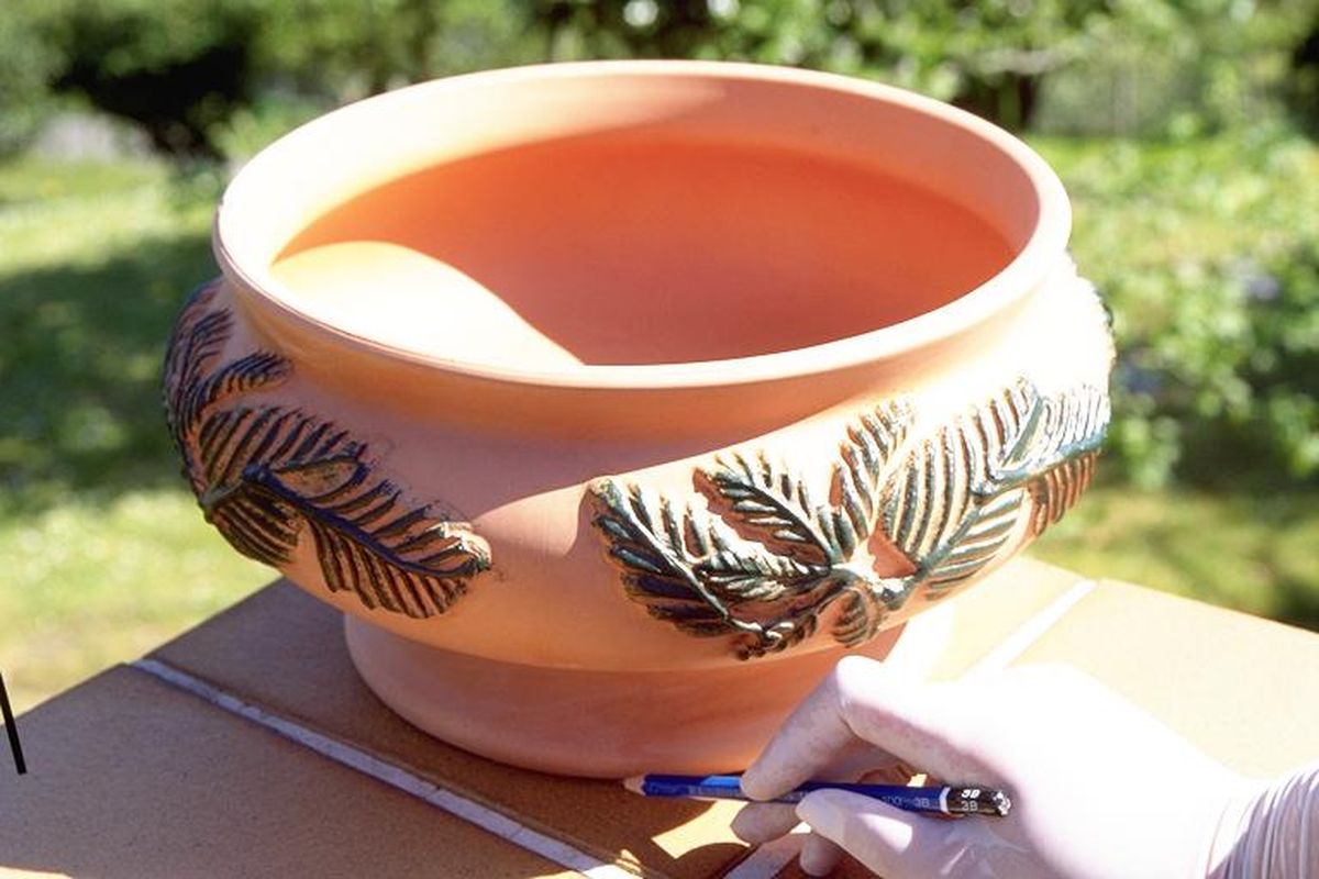 Fijar un macetero en el exterior paso 2