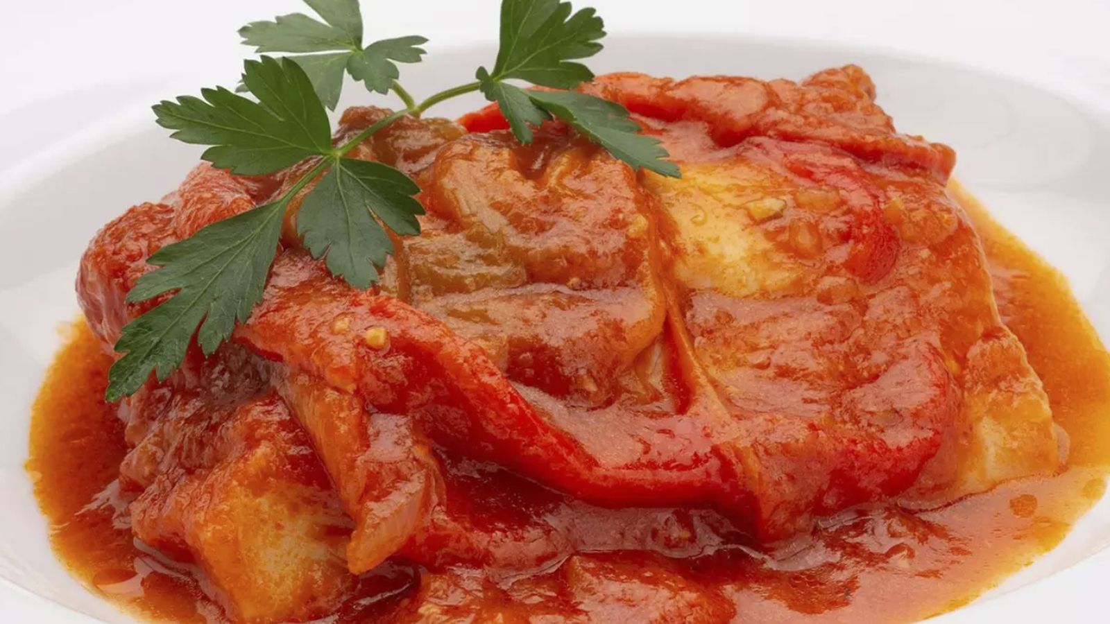 Bacalao a la riojana con salsa de tomate y pimientos