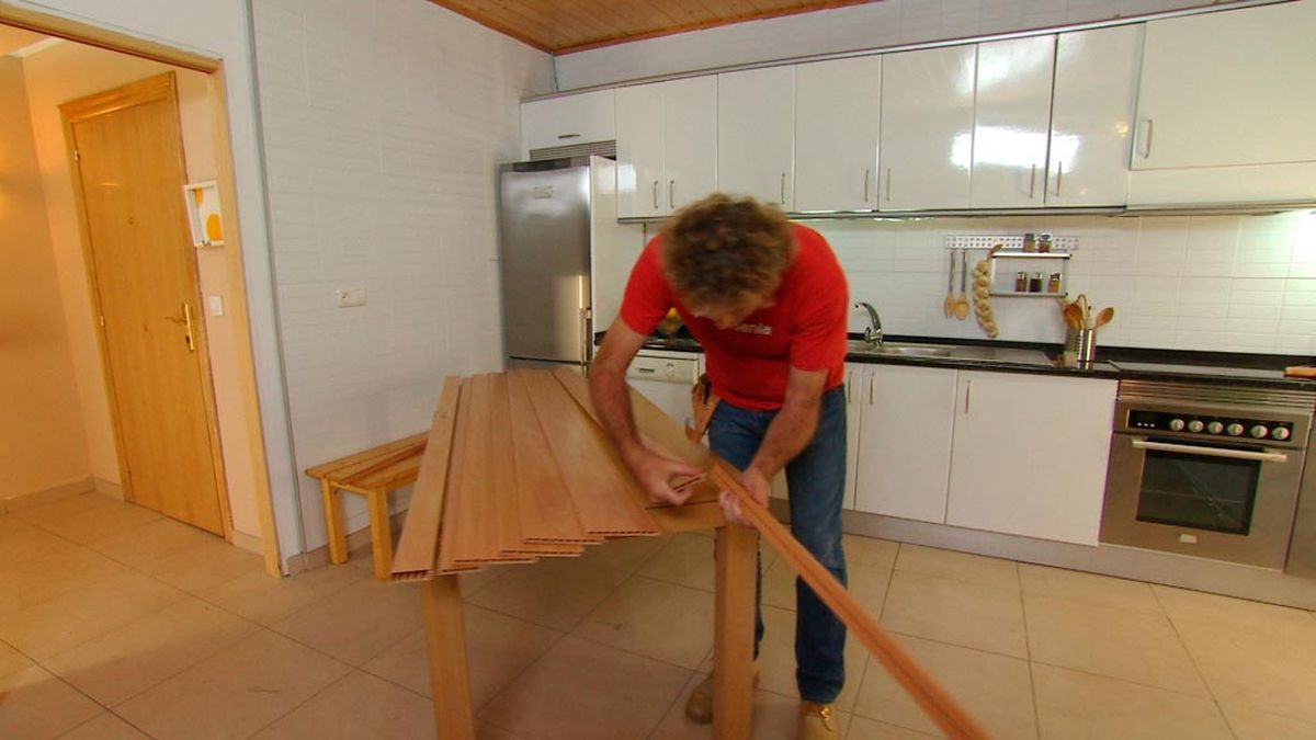 Cómo instalar una puerta plegable paso 3