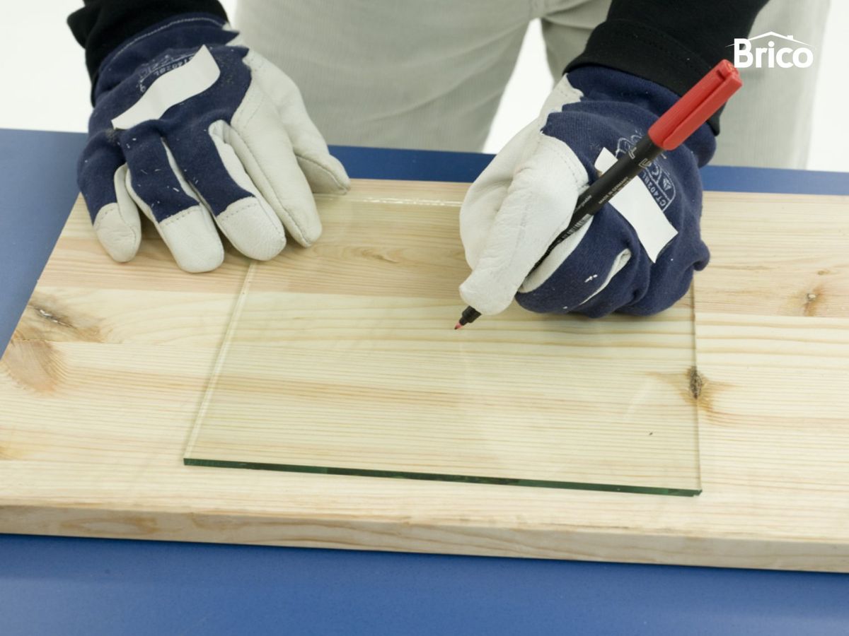 Marcar el punto en el cristal