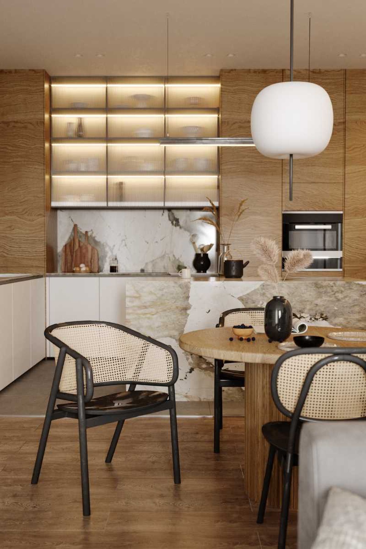 Cocina moderna con sillas de ratán.