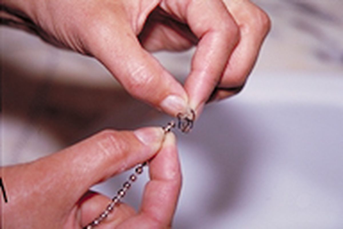 Sustitución de cadena y tapón de desagüe paso 2