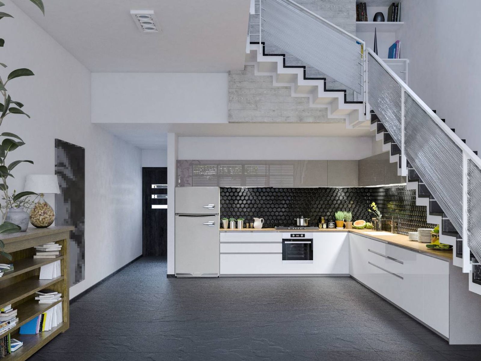 Un ejemplo perfecto de cómo integrar una cocina en el hueco de una escalera. Un ejemplo perfecto de cómo integrar una cocina en el hueco de una escalera.