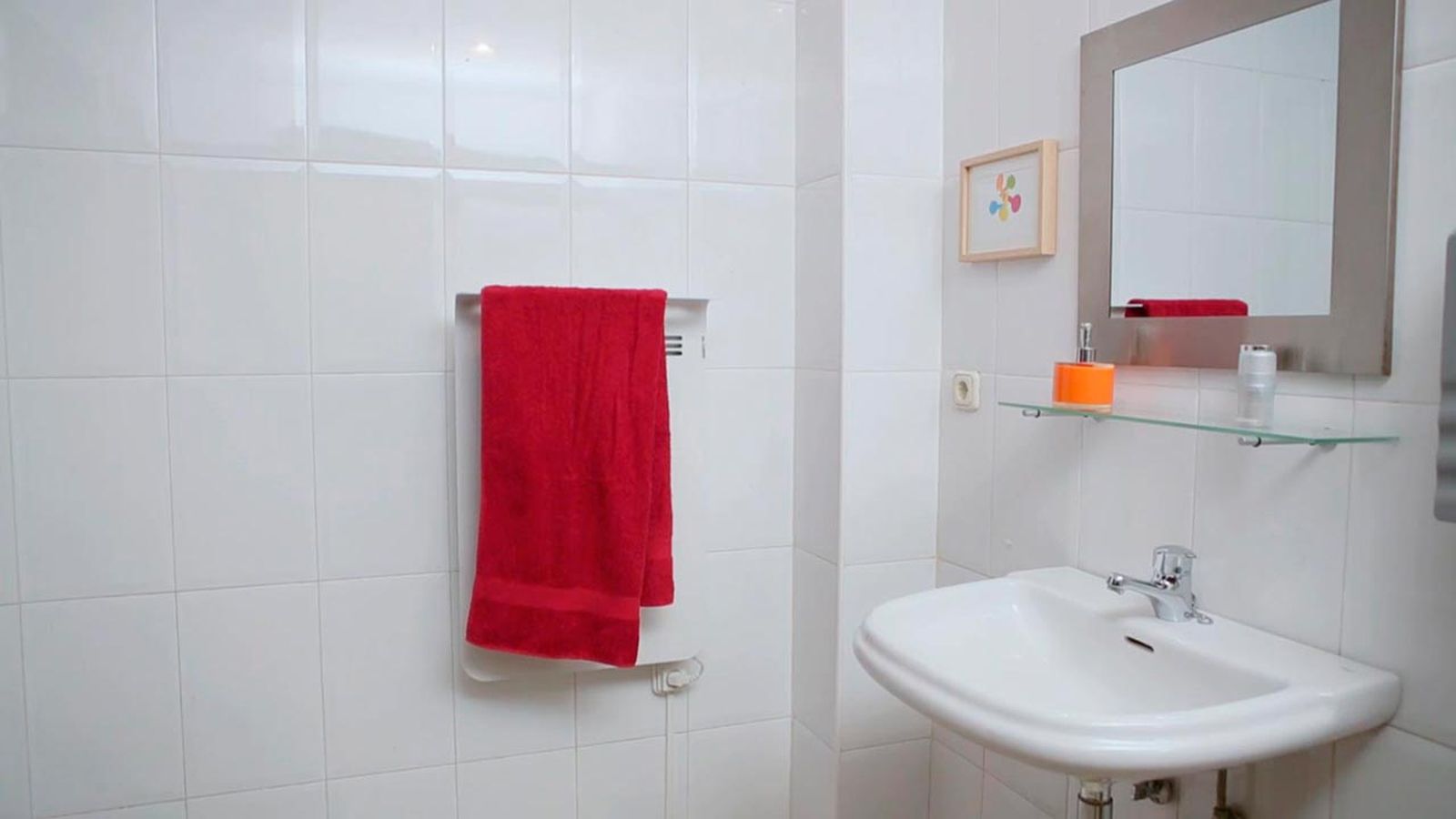 Colocar un calefactor toallero en el baño paso 8
