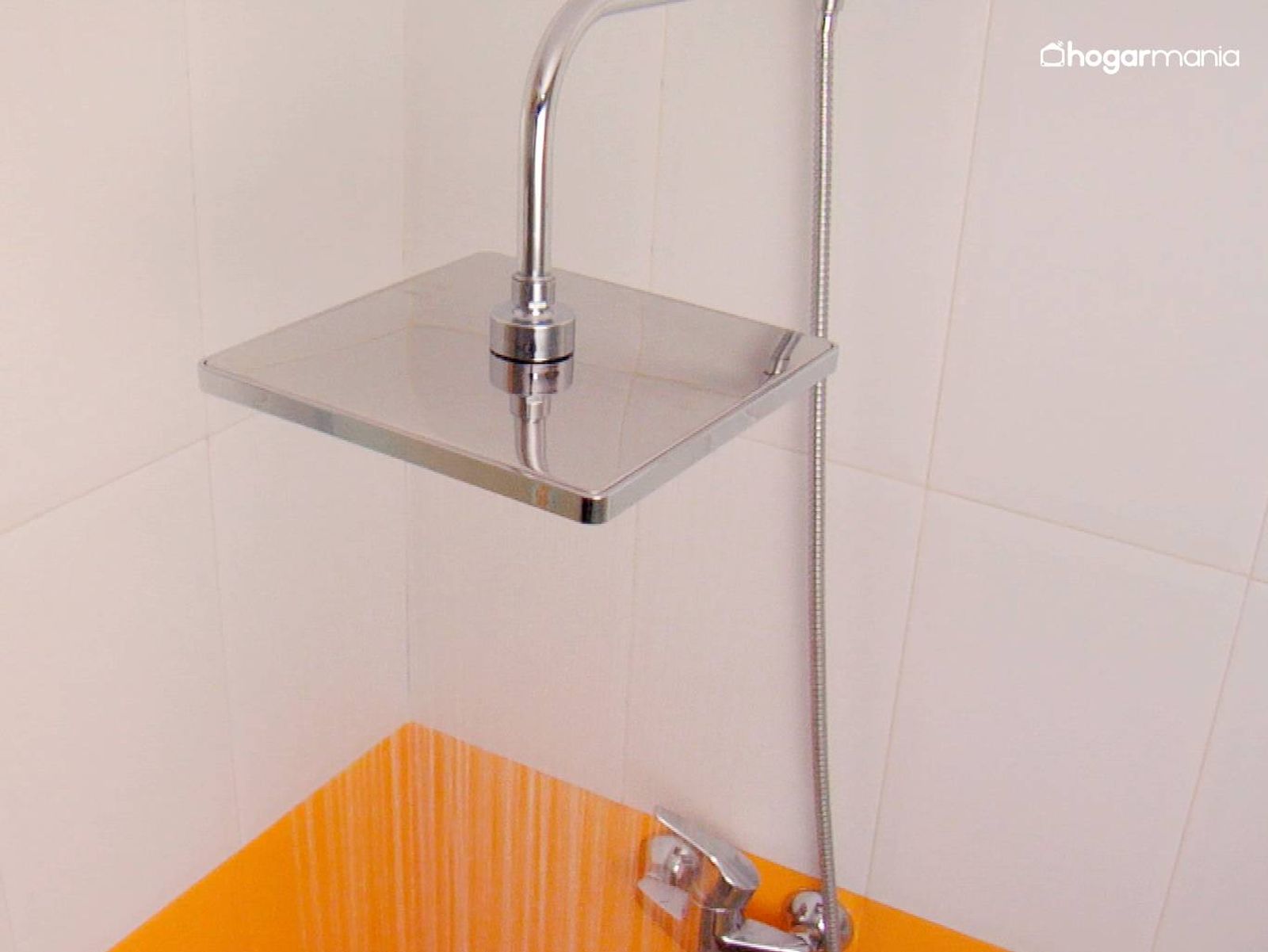 Cómo colocar un brazo de ducha