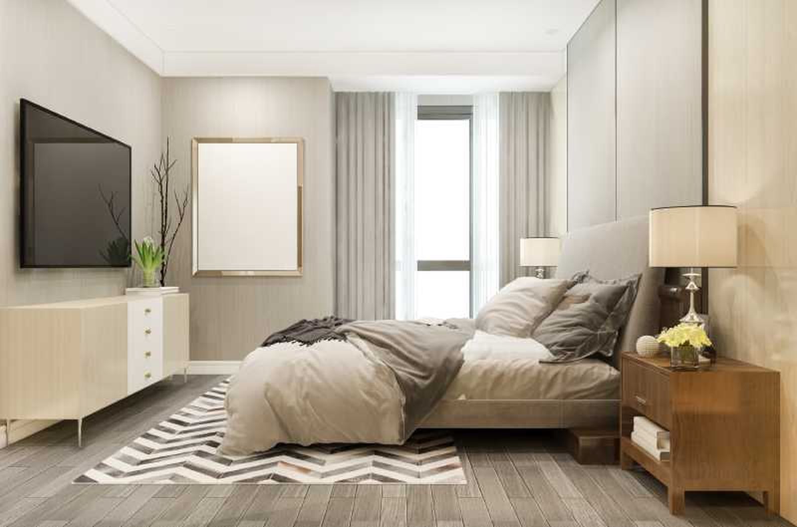 Dormitorio pequeño con alfombra a los pies de la cama. Dormitorio pequeño con alfombra a los pies de la cama.