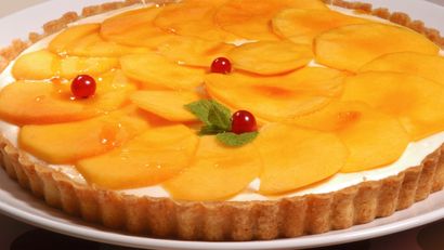 Tarta de queso y melocotón, receta de Karlos Arguiñano