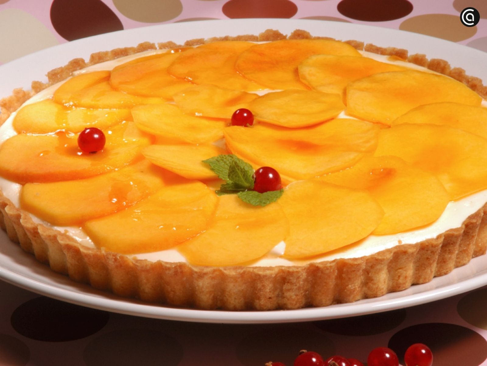 Tarta de queso y melocotón, receta de Karlos Arguiñano