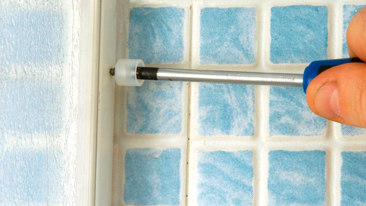 Columna de ducha con mampara paso 12