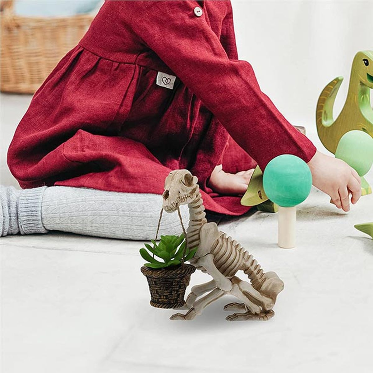 maceta con forma de esqueleto