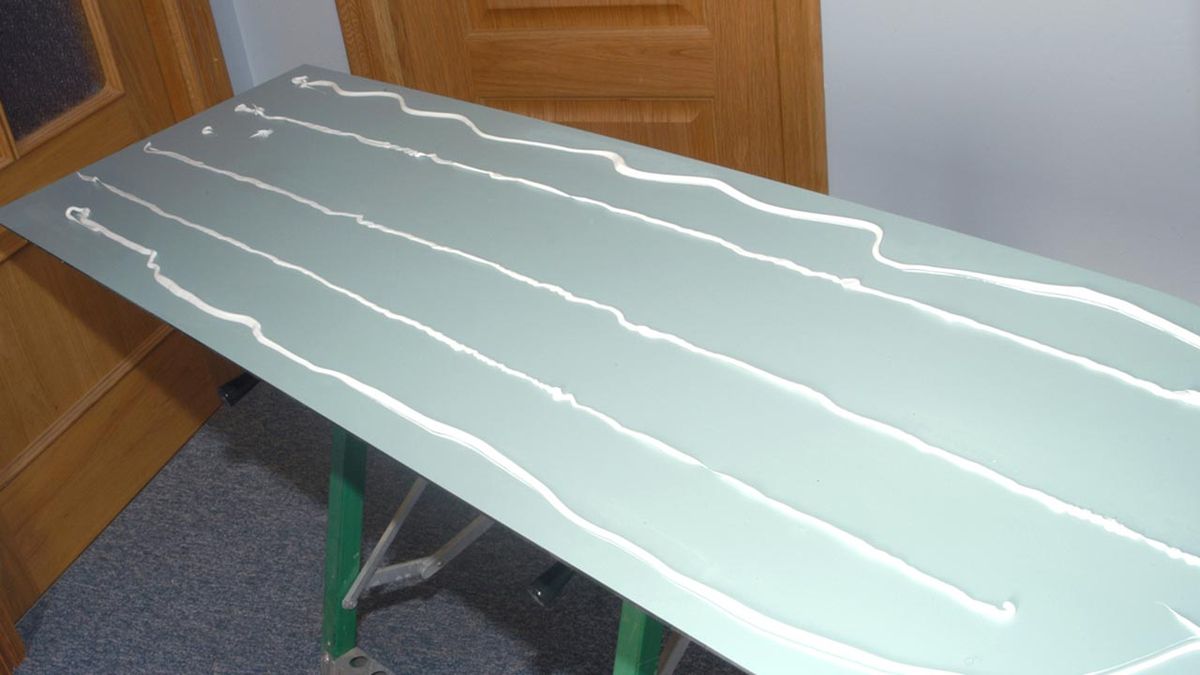 Pegar un espejo en la pared paso 4