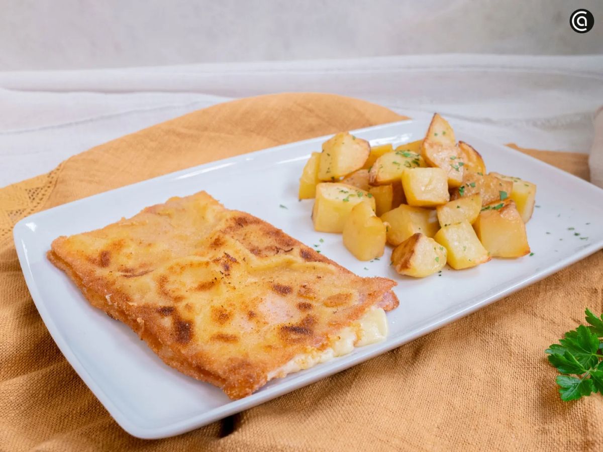 Escurre y sirve acompañado de patatas