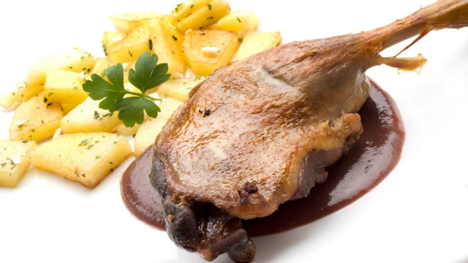 Confit de pato con patatas y salsa de higos