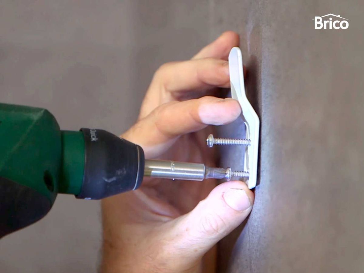 Colocar los soportes de fijación