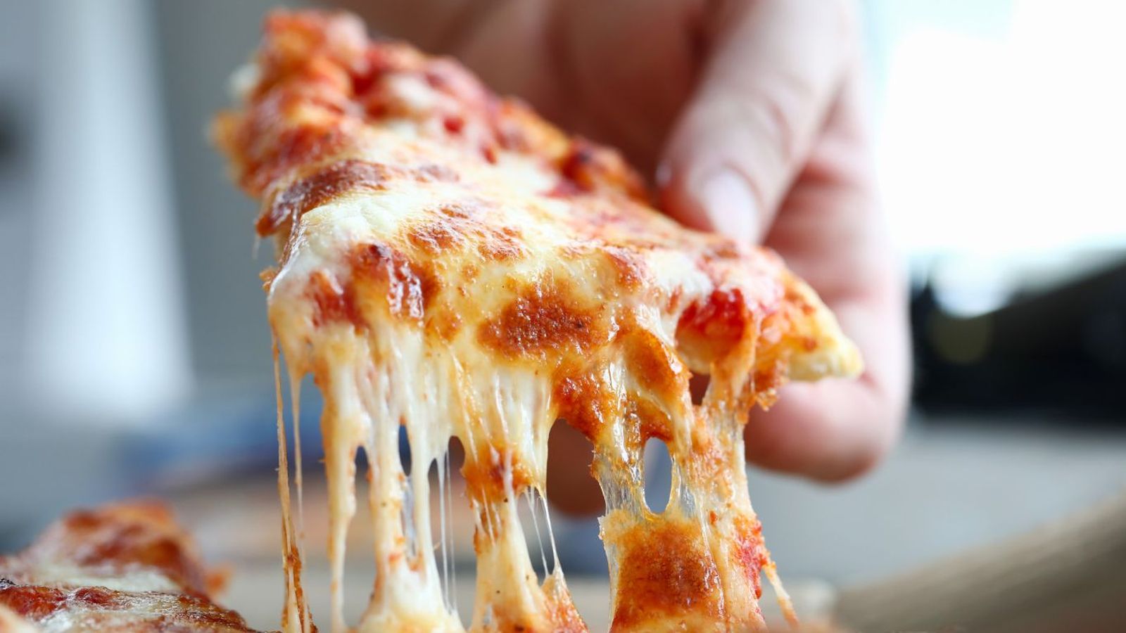 Pizza con queso fundido