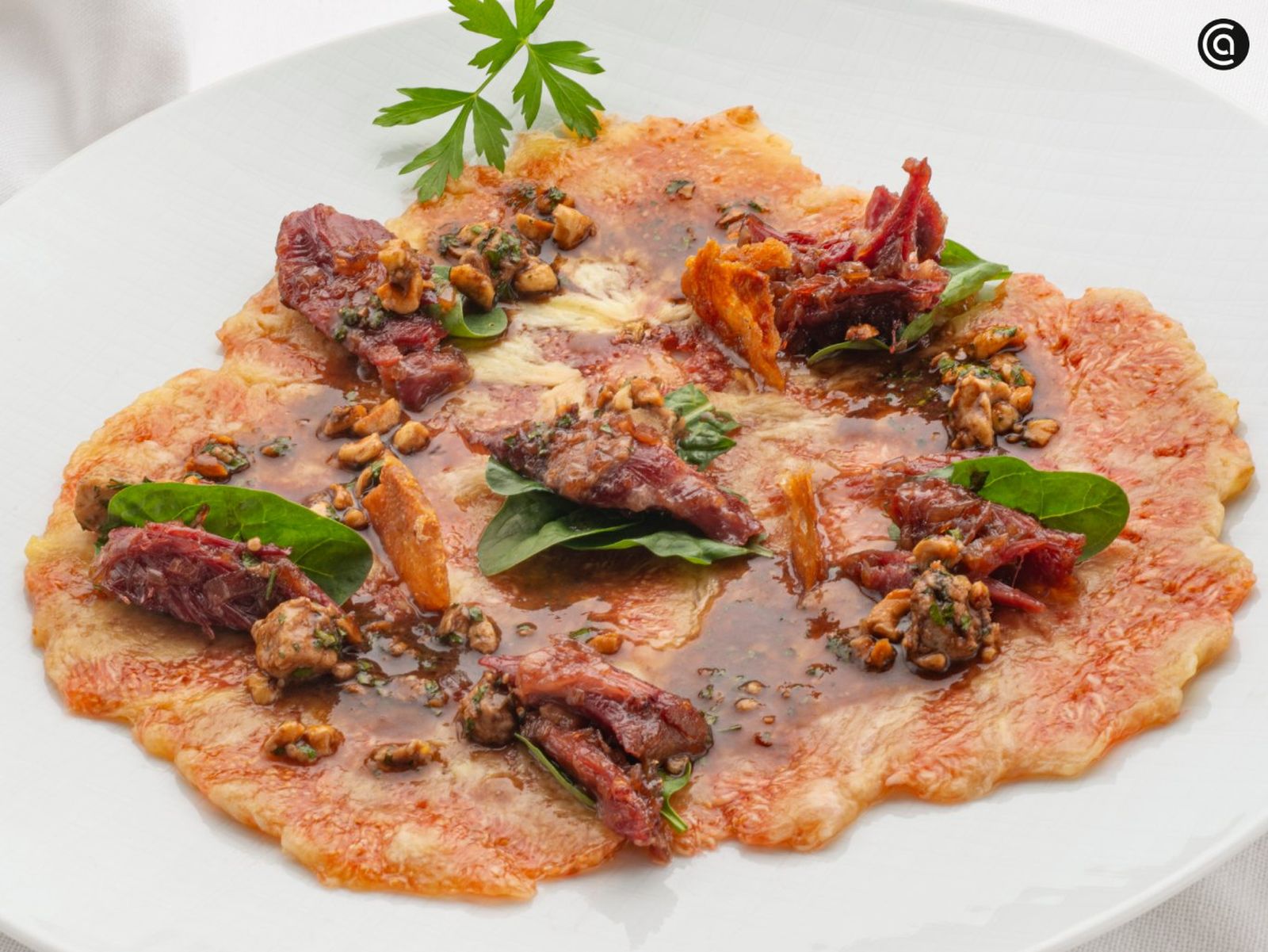 Carpaccio de higos con confit de pato, receta de Joseba Arguiñano