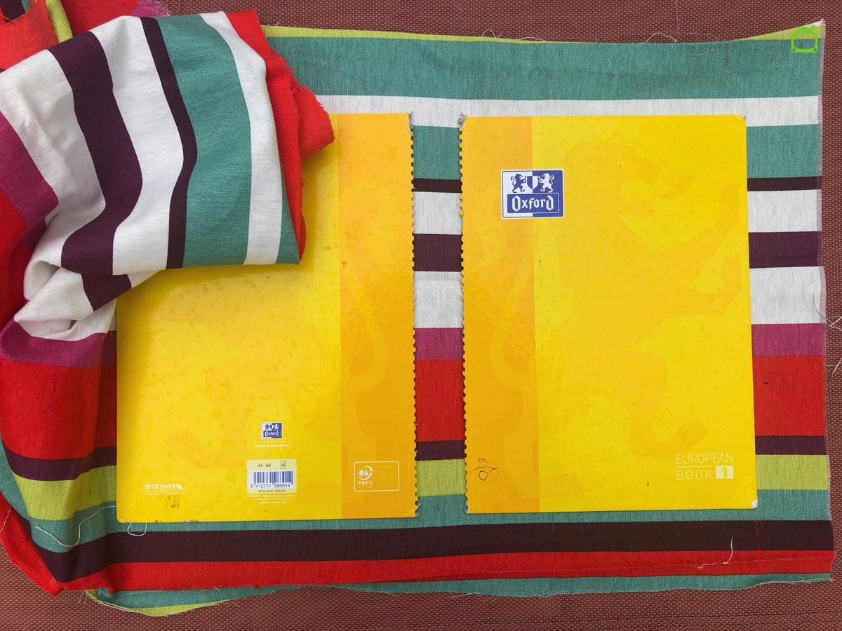 Forra las tapas del cuaderno con tela