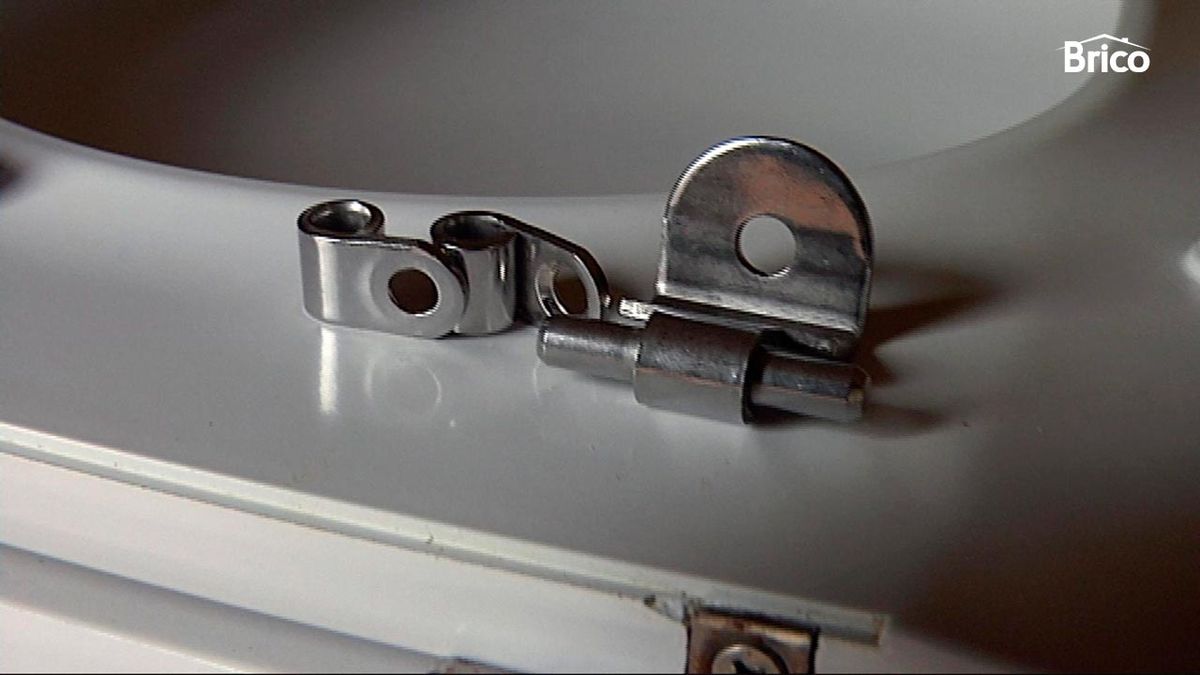 Sustituir bisagras de la tapa del wc paso 4