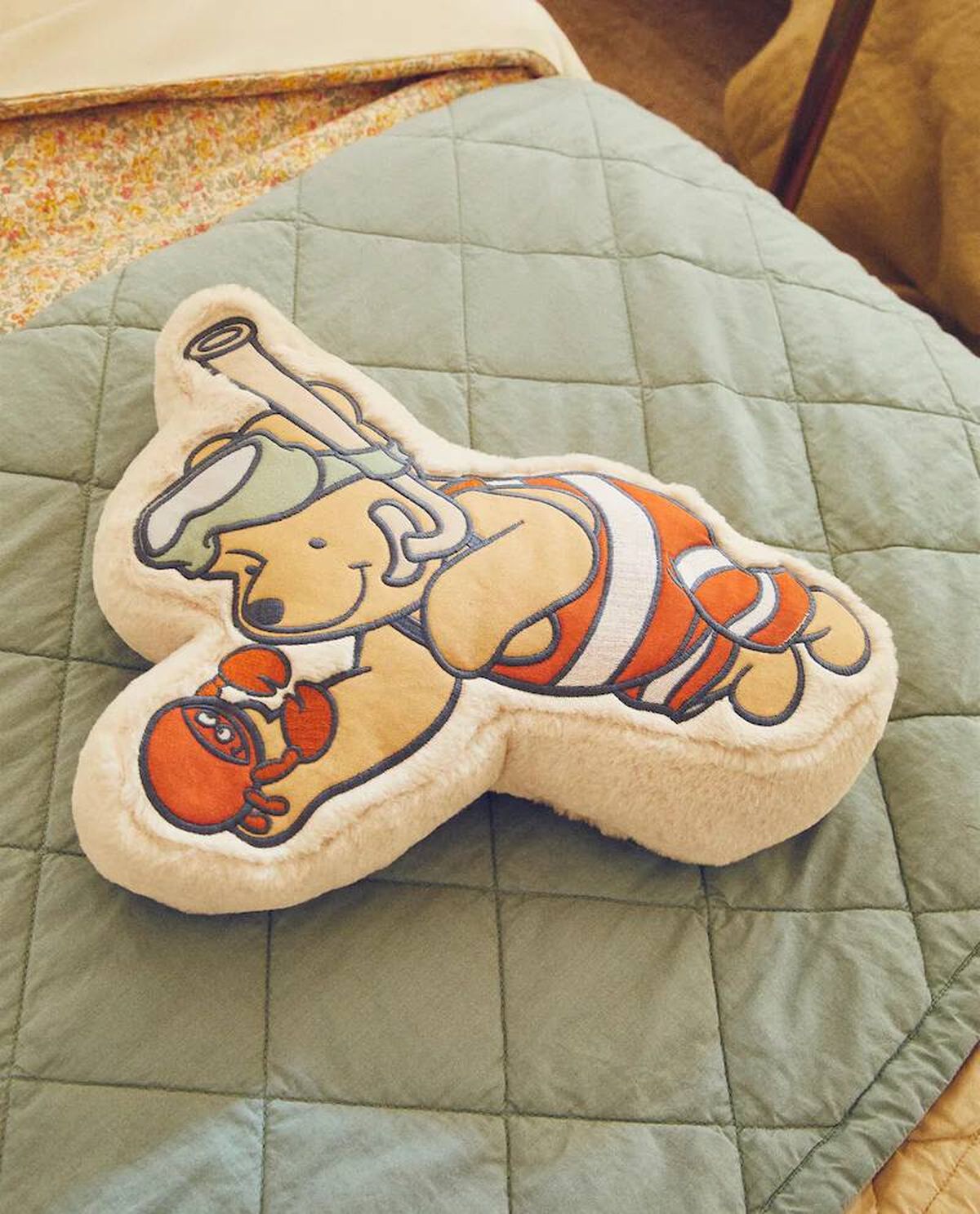 Cojín de Winnie The Pooh.