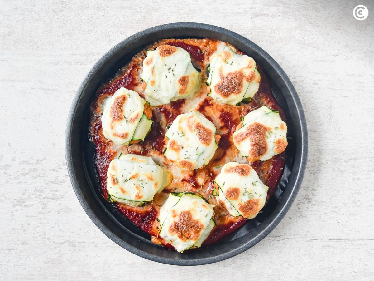 Gratinar los raviolis de calabacín al horno