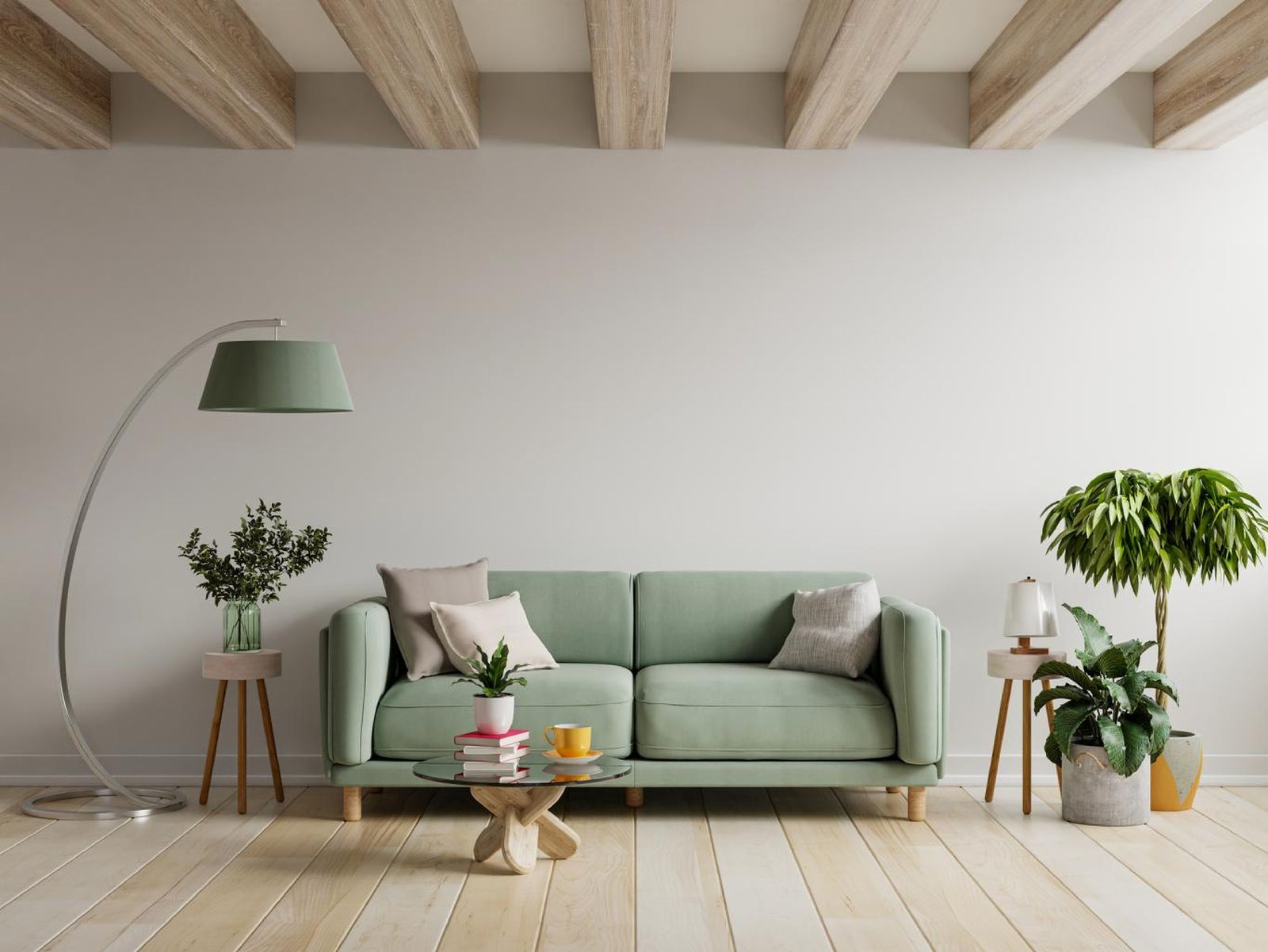 Salón minimalista con sofá en verde salvia.