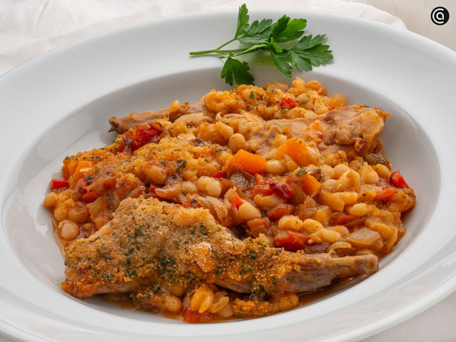 Gratinado de alubias con conejo, receta de Karlos Arguiñano