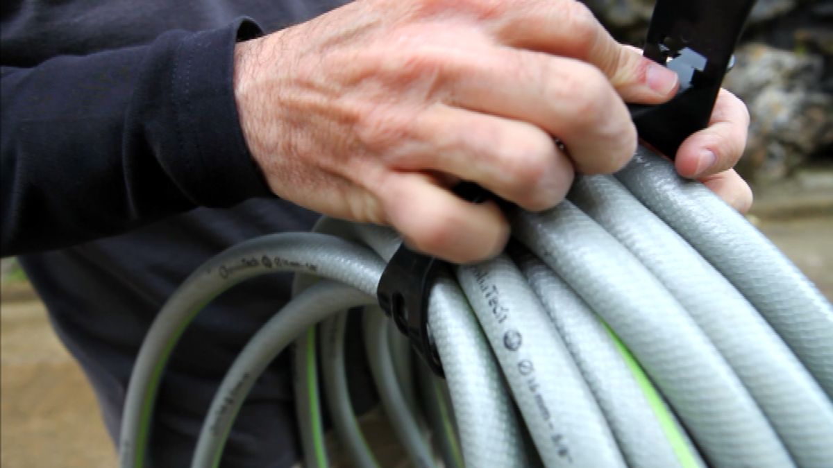 Enrolla manguera paso 8