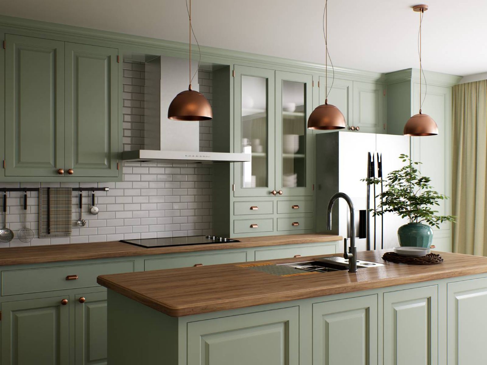 El verde combinado con madera natural transforma la cocina en un espacio cálido y acogedor.