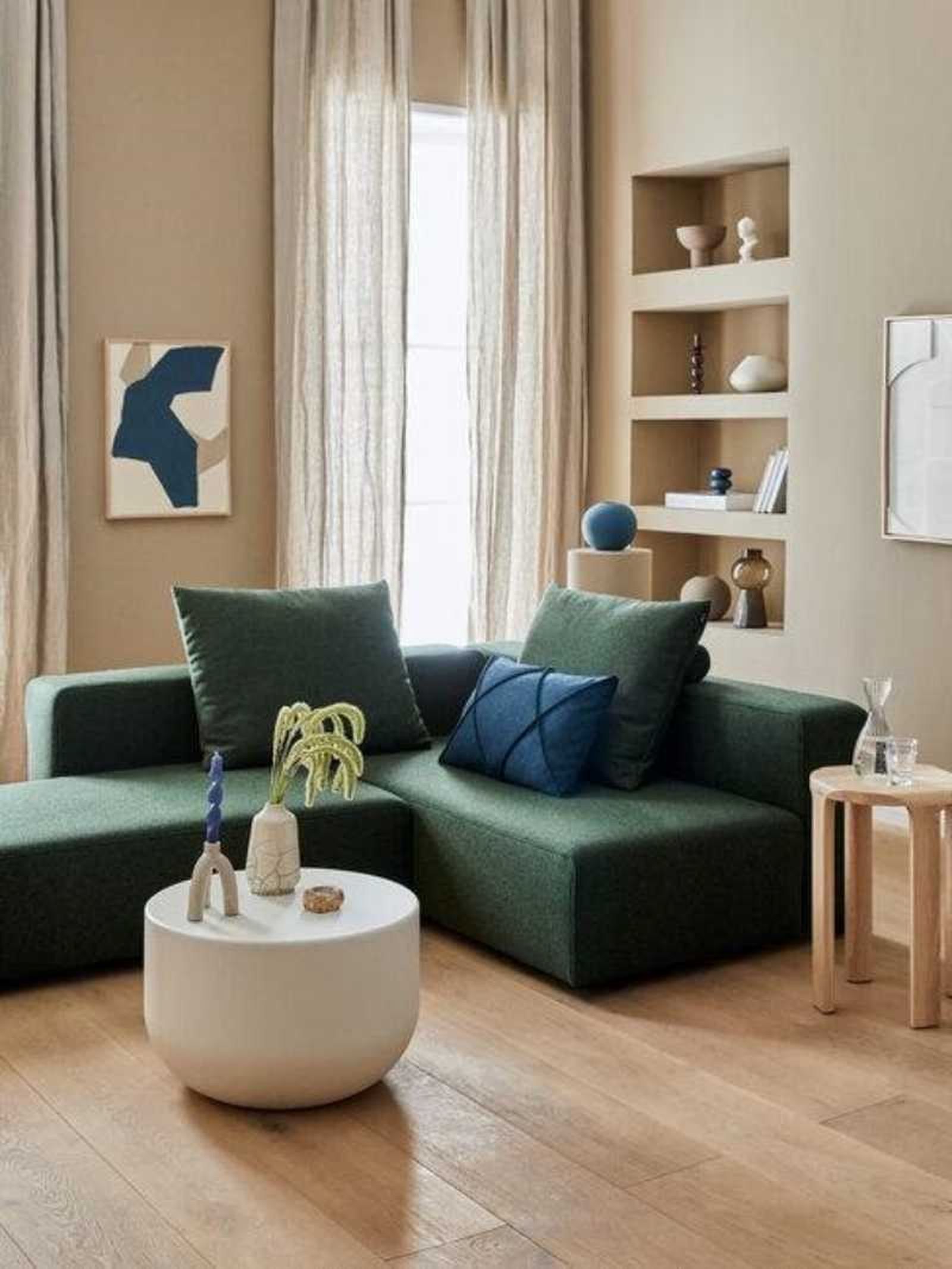 Salón con sofá verde. Salón con sofá verde.