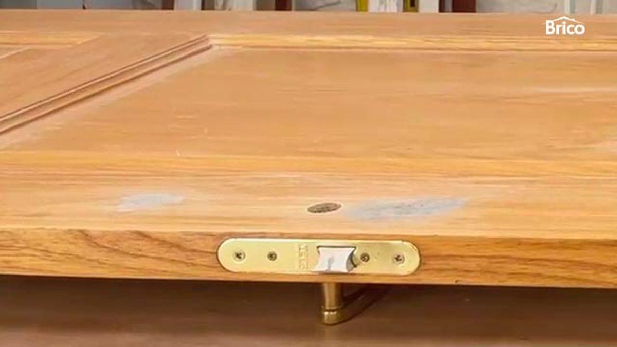 Como pintar una puerta de madera con pistola paso 4