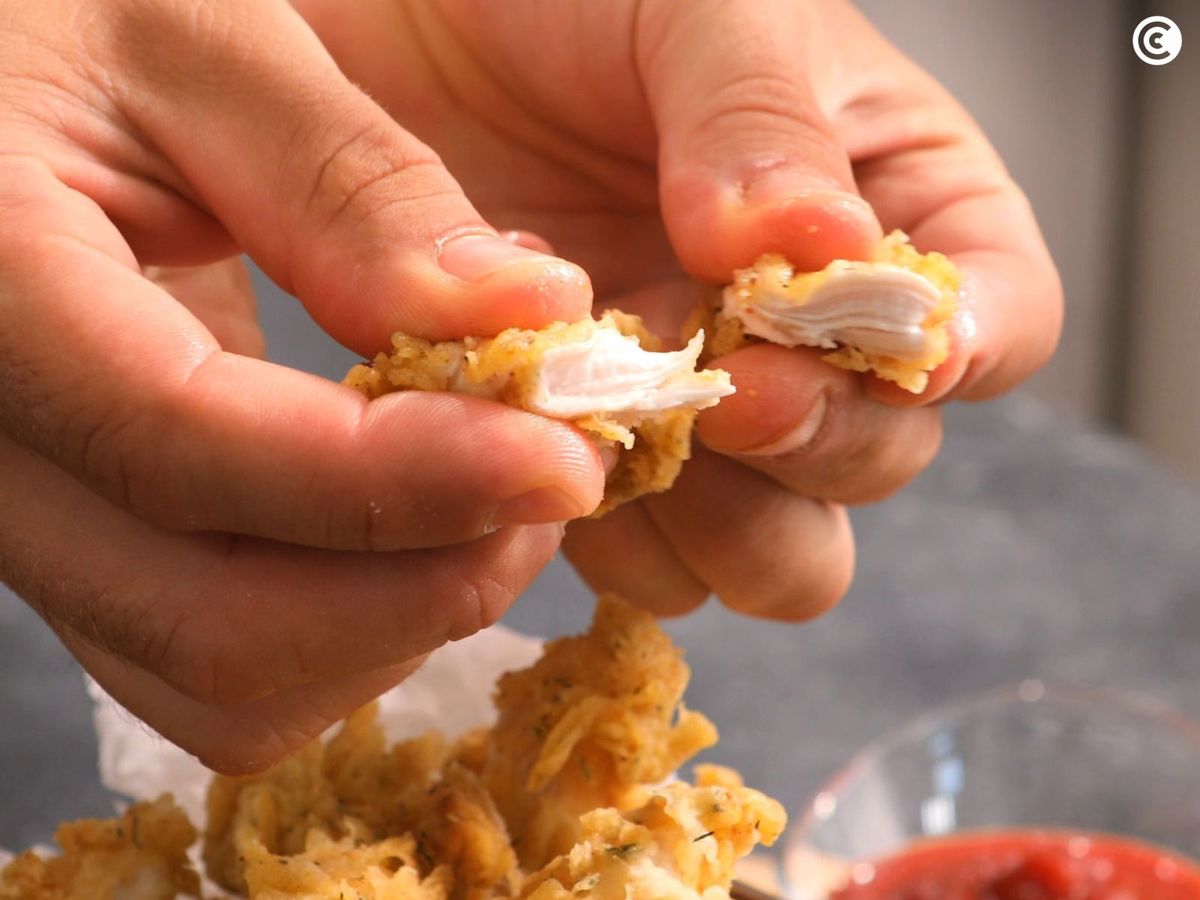 Pollo frito KFC jugoso por dentro y crujiente por fuera