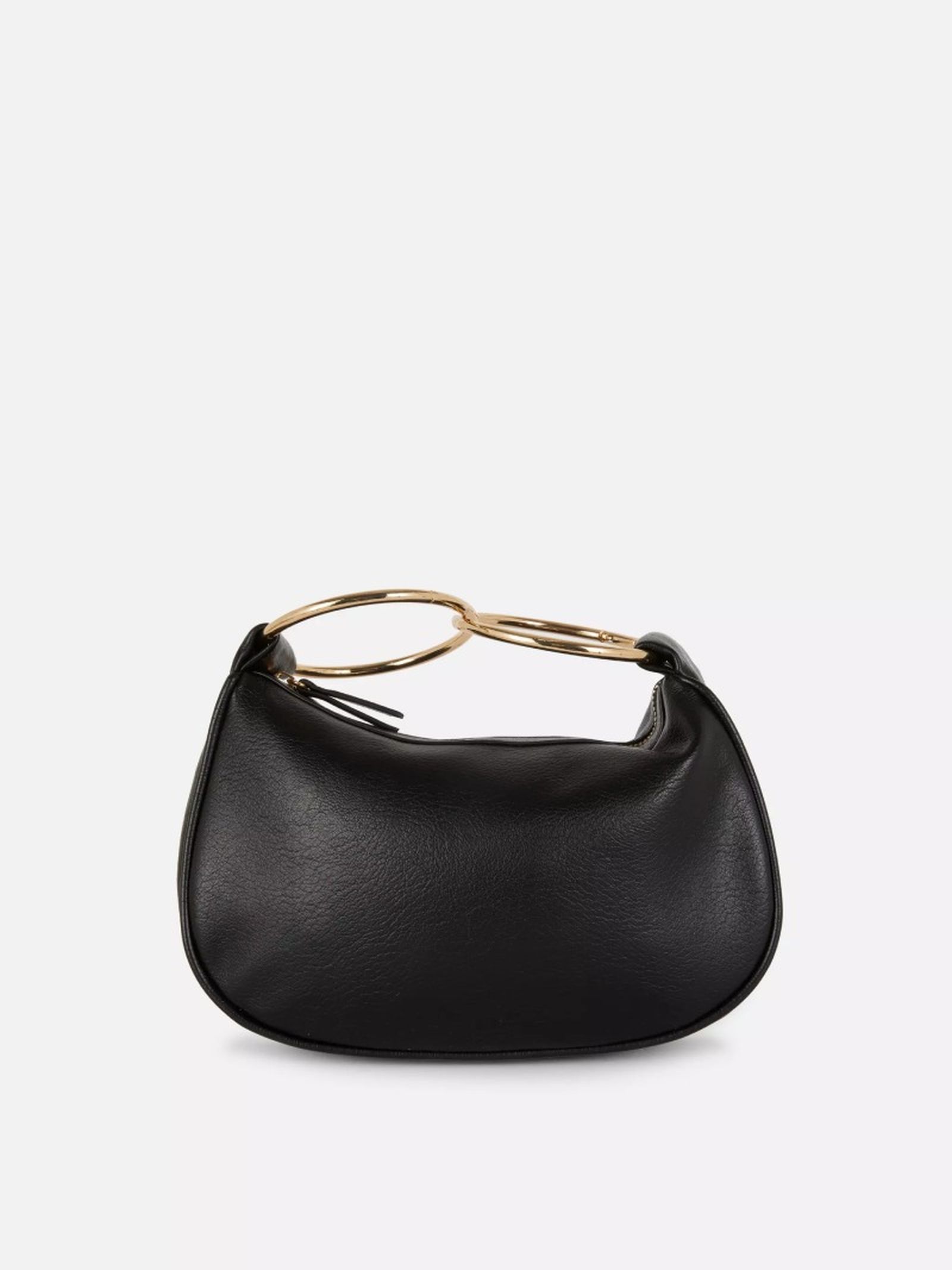 Bolso con anillas doradas de Rita Ora Bolso con anillas doradas de Rita Ora