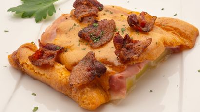 Puerros asados y gratinados con ibéricos, receta de Joseba Arguiñano