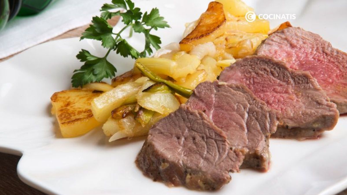 Presa ibérica al horno con patatas panaderas