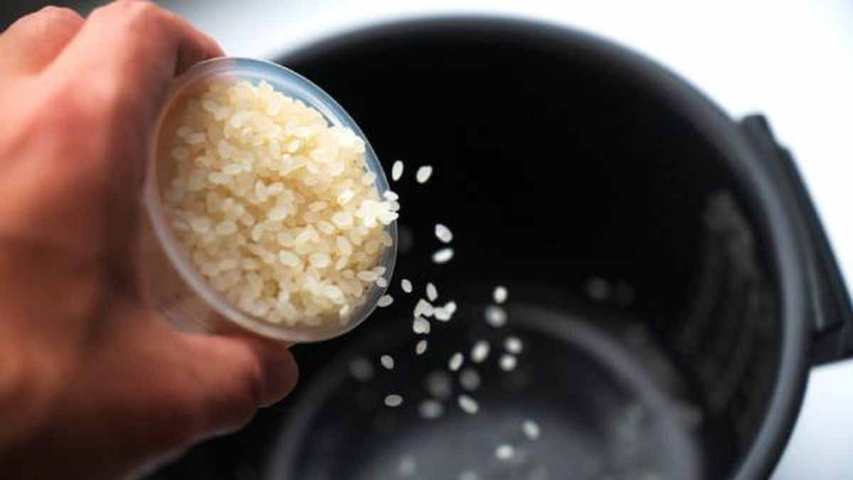 cuantos gramos de arroz por persona taza