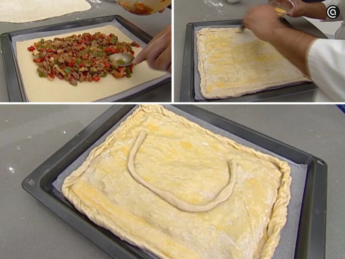 Rellena la masa, sella la empanada, píntala con yema y hornéala