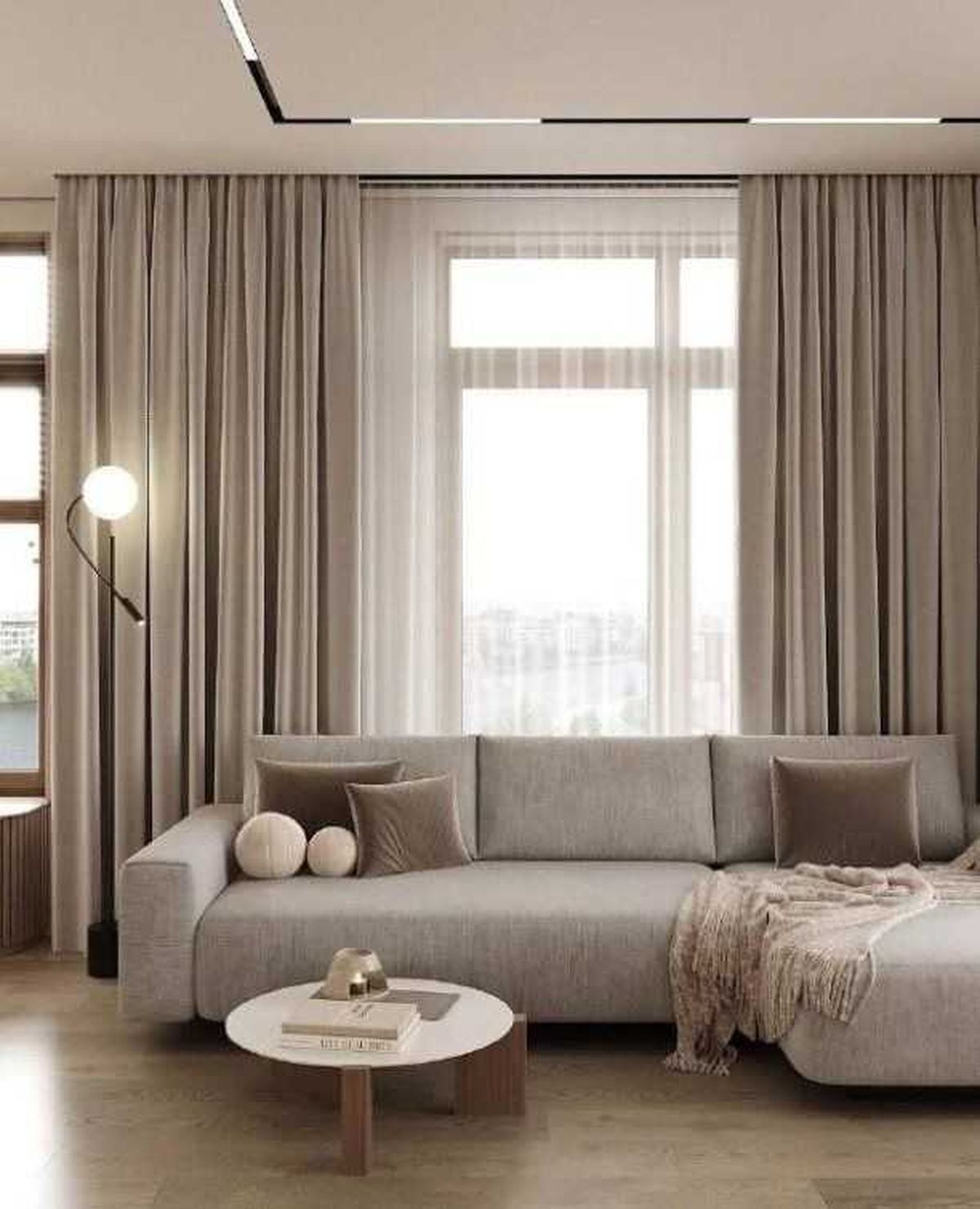 Salón beige con textiles naturales.