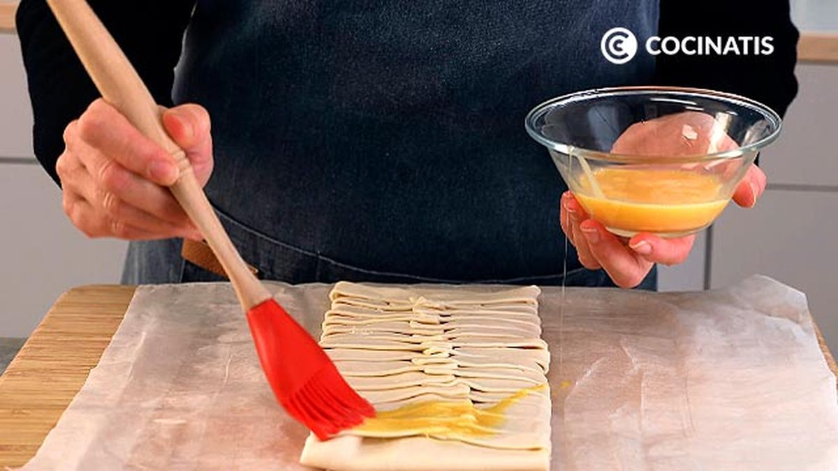 Receta de trenza de hojaldre salada rellena de jamÃ³n y queso  paso 4