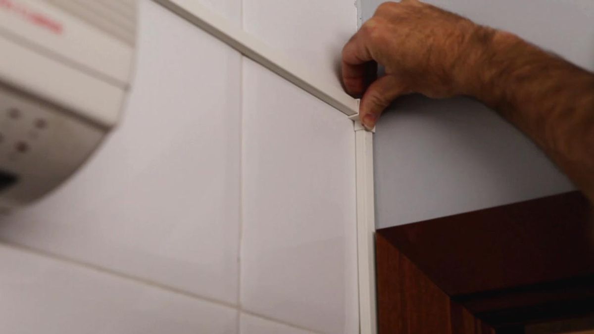 Cómo instalar un calefactor eléctrico de pared paso 12