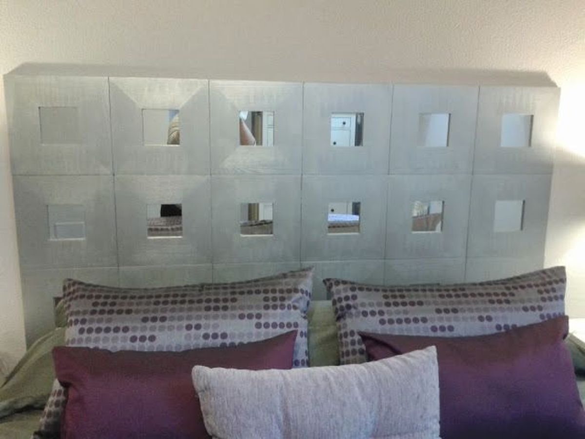 Cabeceros de madera en la comunidad de Hogarmania 6