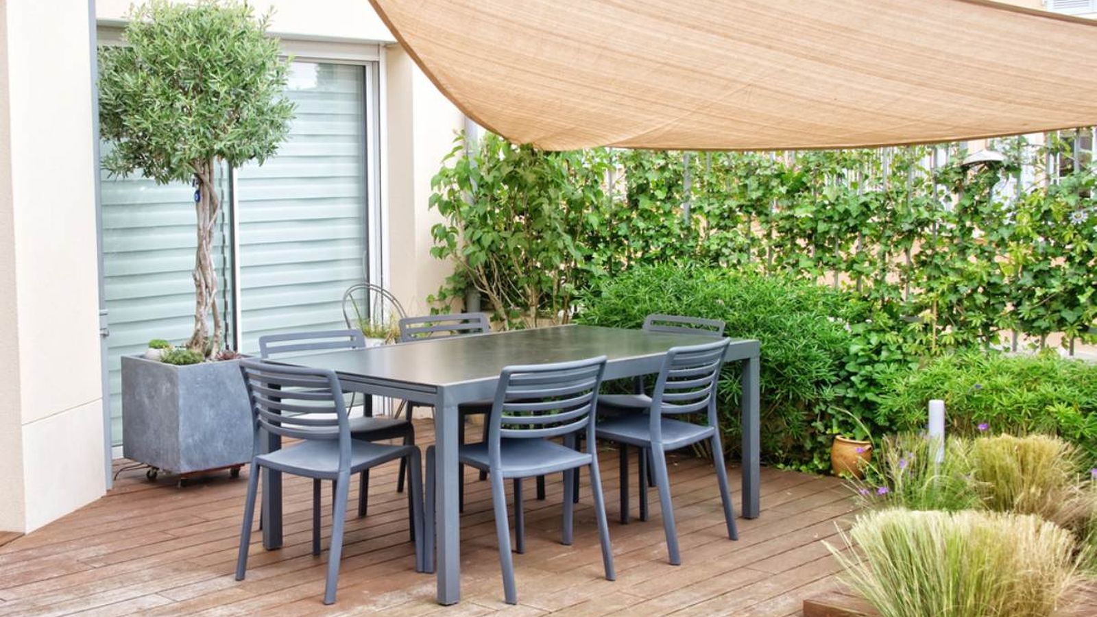 Toldo vela para dar sombra